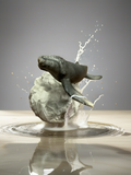 Whale figurine on ‘rock’ stand