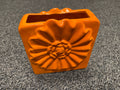 Orange ceramic rectangular vase with embossed sunflower design