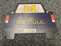 University of Michigan Go Blue wood car-shaped sign with block M logo and #1 Fan plate