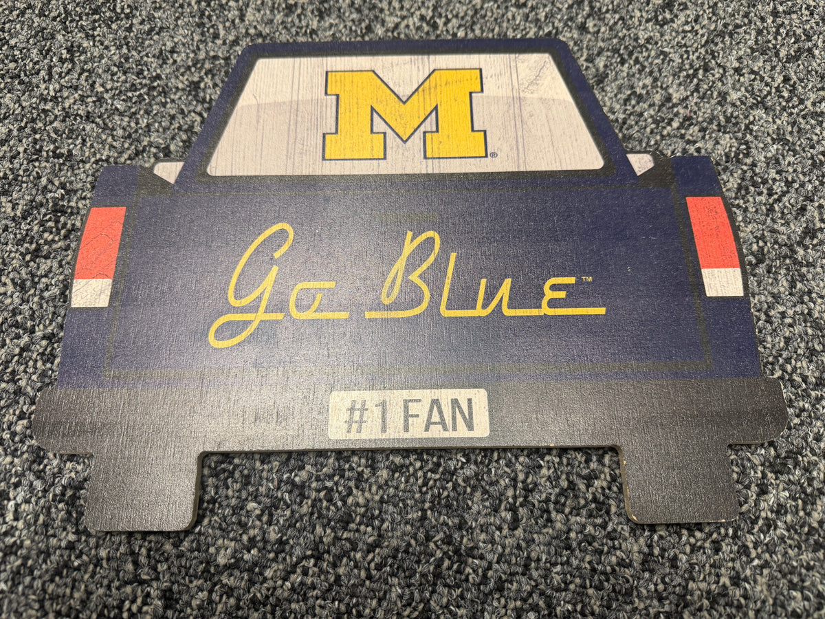University of Michigan Go Blue wood car-shaped sign with block M logo and #1 Fan plate