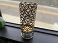 Moroccan filigree metal candle lantern in antique brass finish on ring base