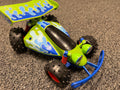 Vintage green blue slime RC buggy race car toy – knobby tires, red springs