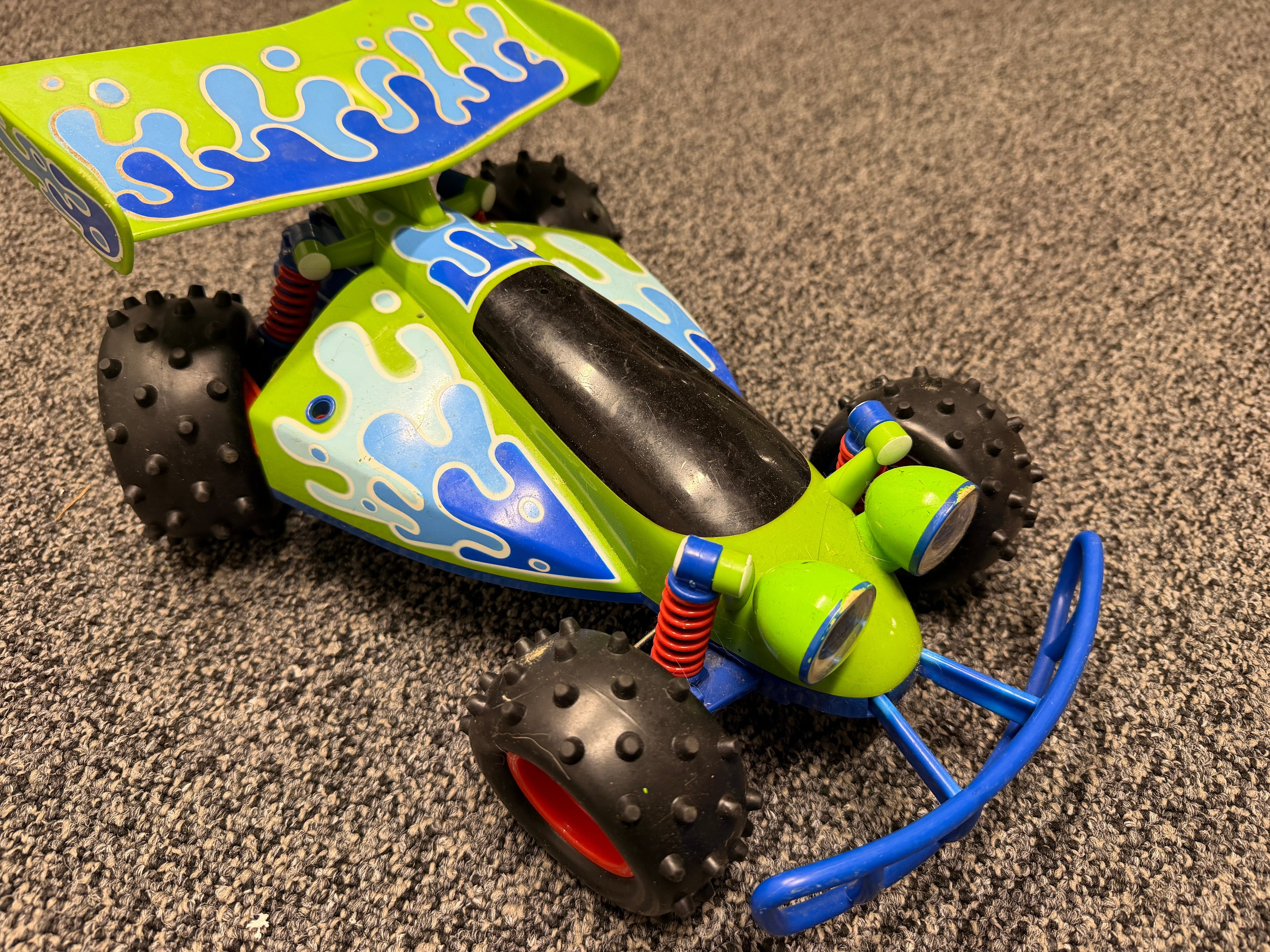 Vintage green blue slime RC buggy race car toy – knobby tires, red springs