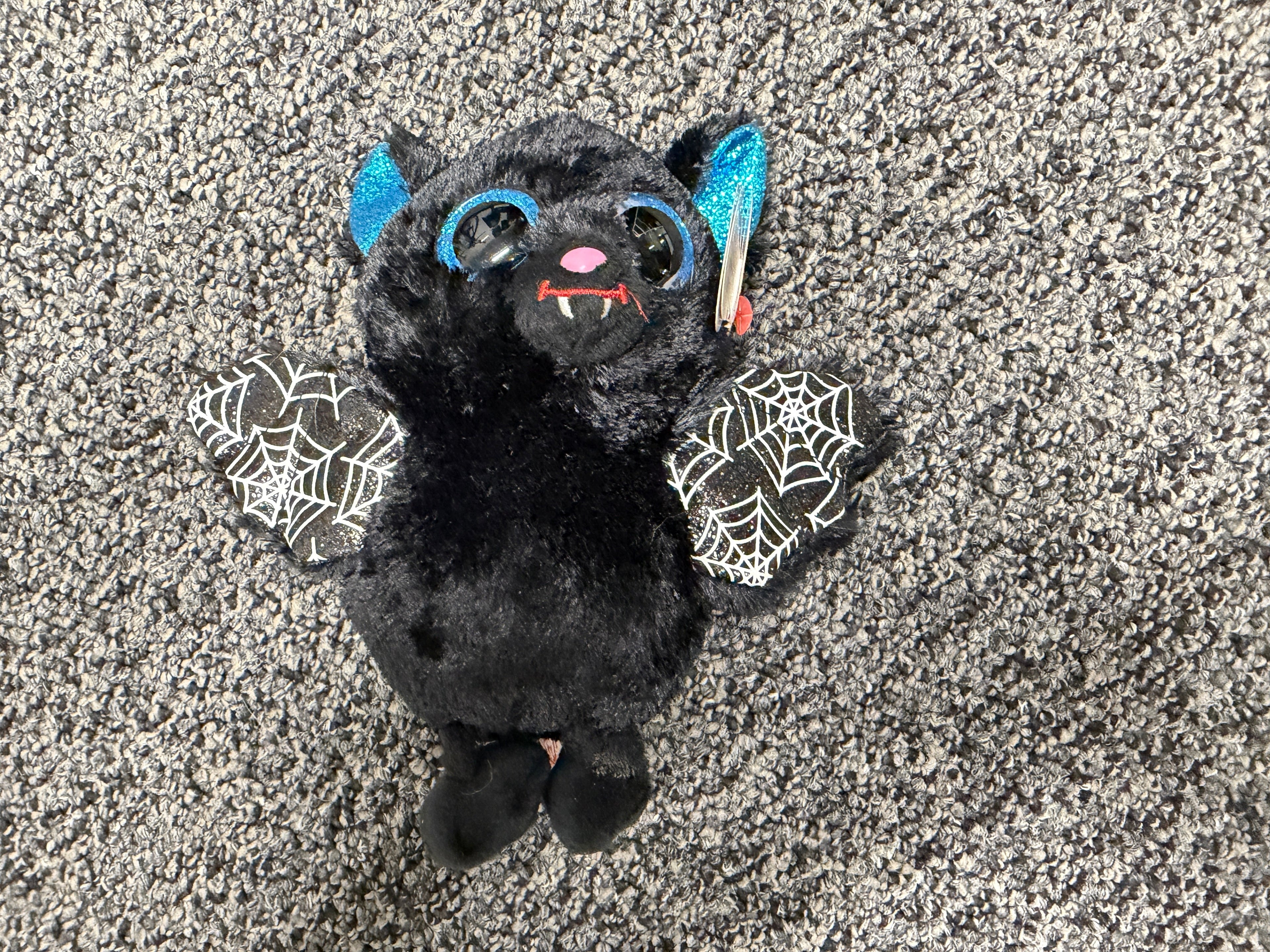 Ty Beanie Boo vampire bat plush – black with blue glitter ears and spiderweb wings
