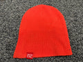 Nyon Royal red ribbed beanie – woven label detail