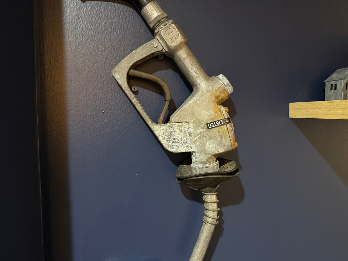 Vintage Gas Pump Nozzle — Cast Iron, Wall-Mounted with Hose