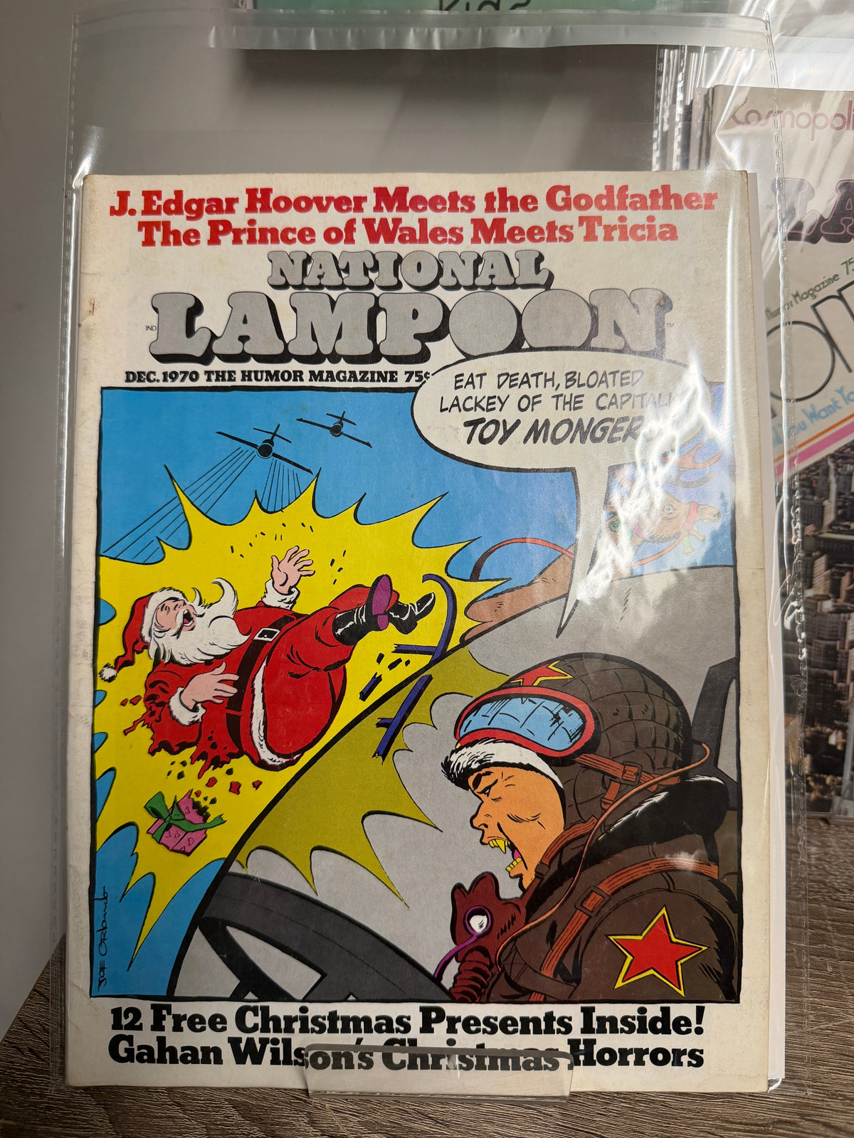 National Lampoon December 1970 Christmas issue, Gahan Wilson cover with Soviet pilot shooting Santa Claus