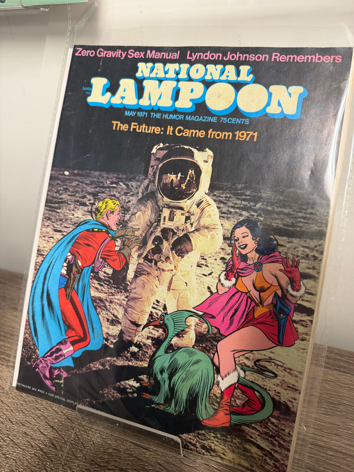 National Lampoon May 1971 The Future issue, NASA moon photo with retro sci-fi comic characters cover