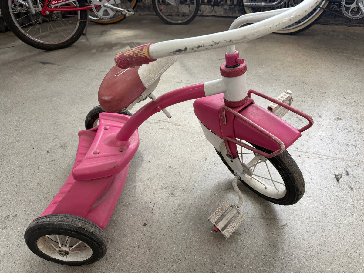 Vintage pink and white tricycle c. 1950s-1960s with front basket and original grips, faded patina