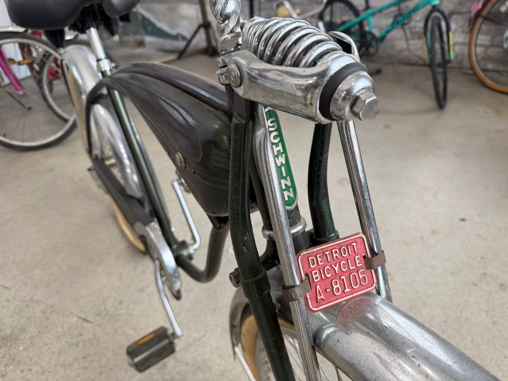 Detroit Bicycle license plate A-8105 on Schwinn springer fork, original red enamel metal plate