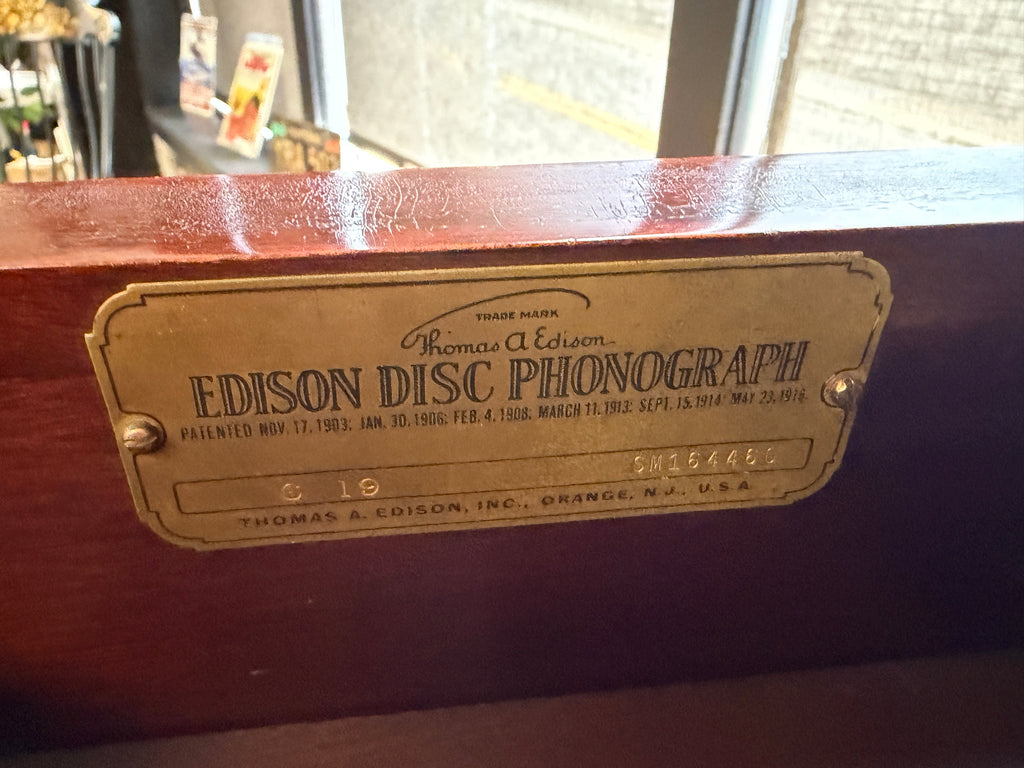 Thomas A. Edison Disc Phonograph brass identification plate close-up showing Trade Mark signature, Edison Disc Phonograph name, patent dates November 1903 through May 1916, and serial number SM161446C