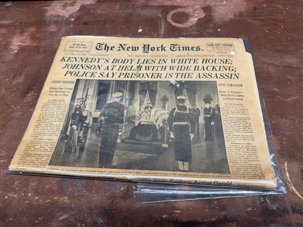 Original New York Times November 24 1963 front page, Kennedy assassination coverage, flag-draped coffin photo, Late City Edition in protective sleeve
