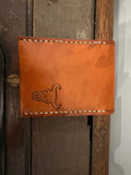 The Forge Billfold in cognac amber leather with hand-stamped Foundry maker mark and cream saddle stitch, Pontiac Built