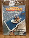 National Lampoon The Gentleman's Bathroom Companion sealed in original poly bag, cover showing man and woman in motorboat in bathtub, cover price $2.50