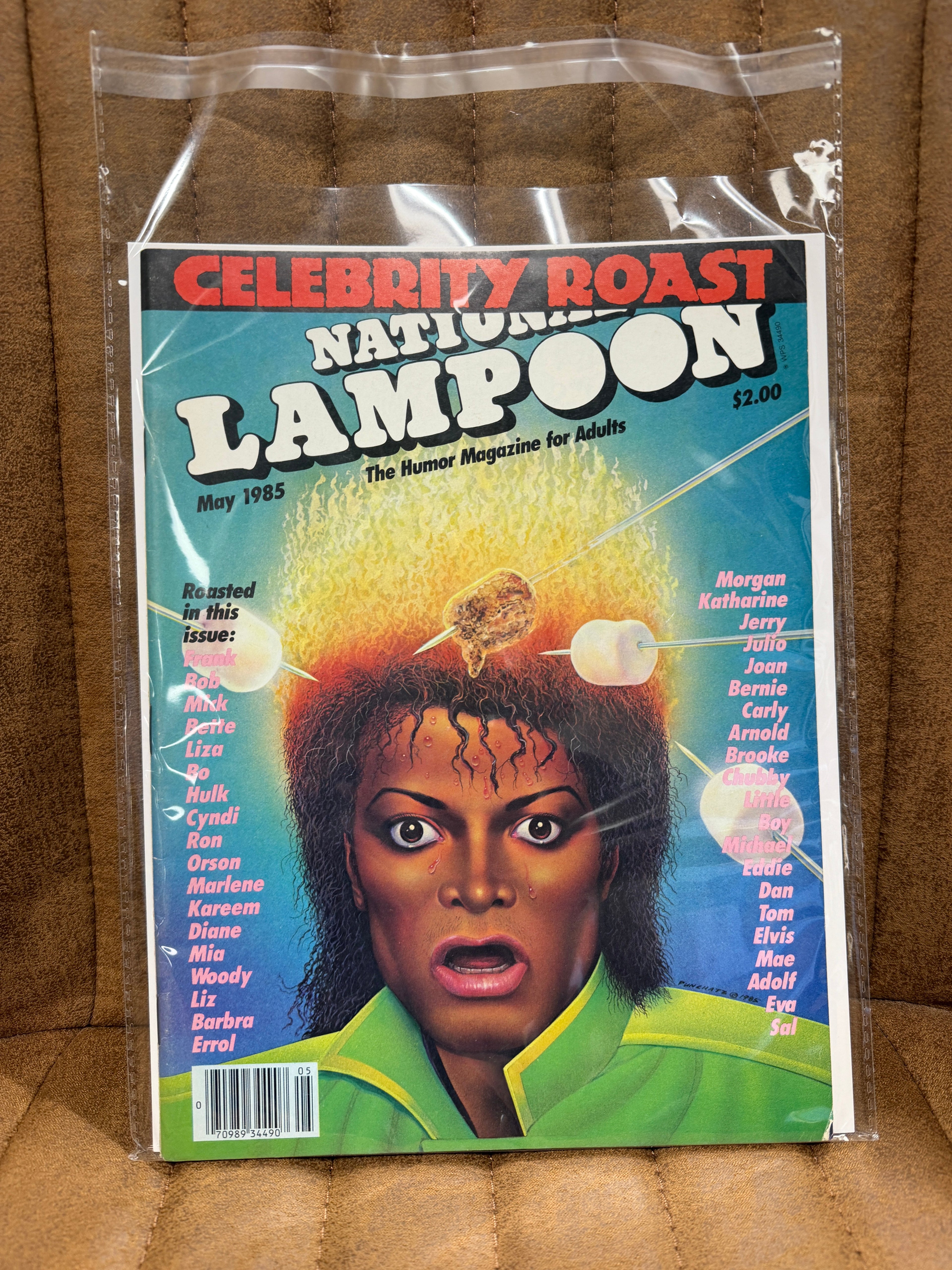 National Lampoon May 1985 Celebrity Roast sealed in original poly bag, Michael Jackson Jheri curl fire cover with marshmallow skewer, cover price $2.00