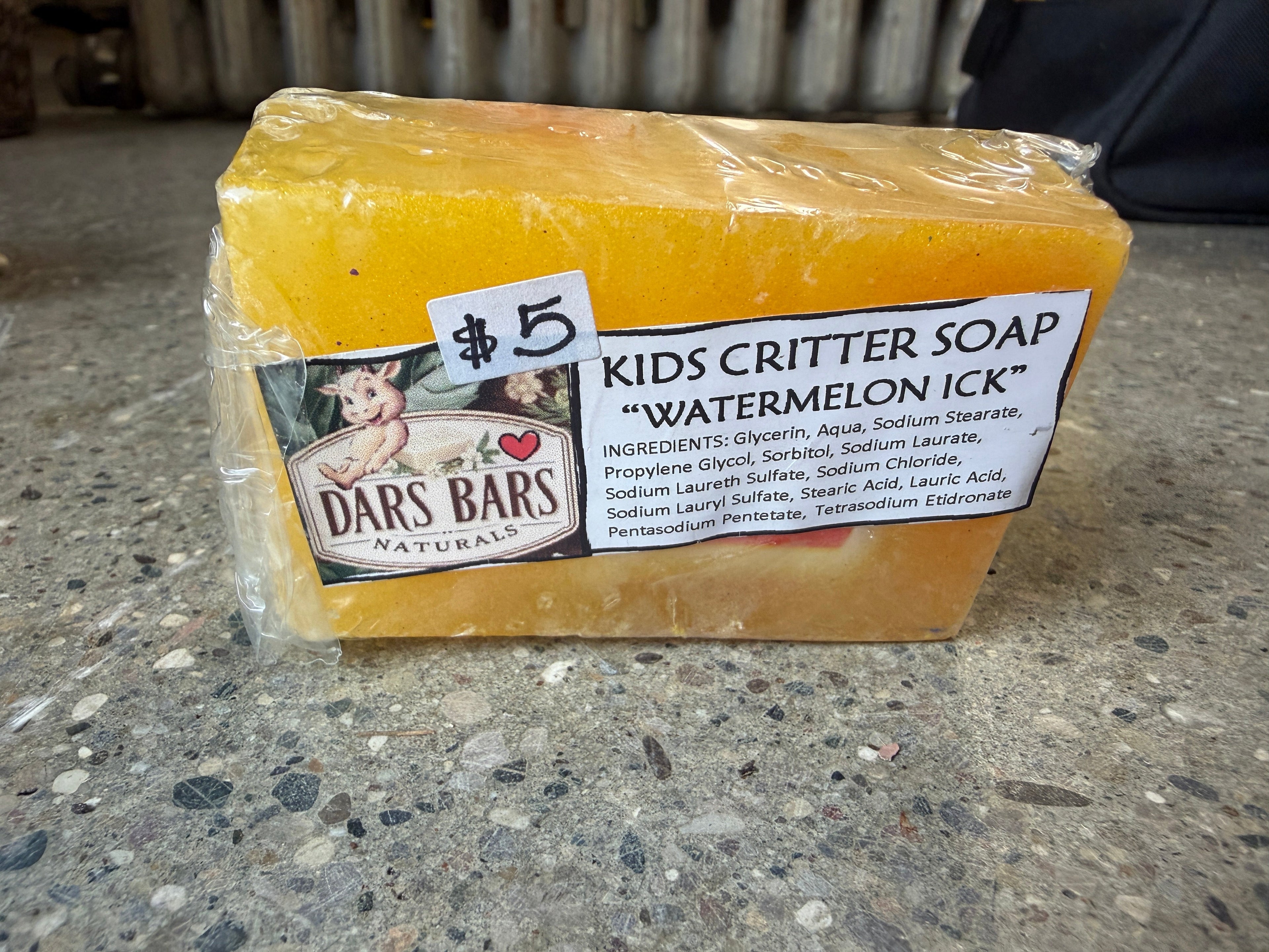 Dars Bars Naturals Kids Critter Soap Watermelon Ick, bright orange-yellow glycerin bar with ingredient label, $5