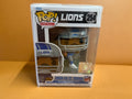 Funko Pop Amon-Ra St. Brown #254 Detroit Lions NFL Football in box with acrylic protector case