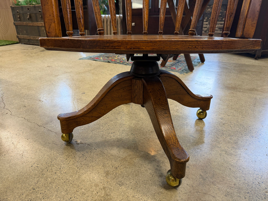 Antique oak banker swivel chair pedestal base with brass ball casters