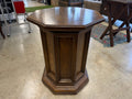 Vintage octagonal walnut pedestal stand with raised panel sides and carved top detail