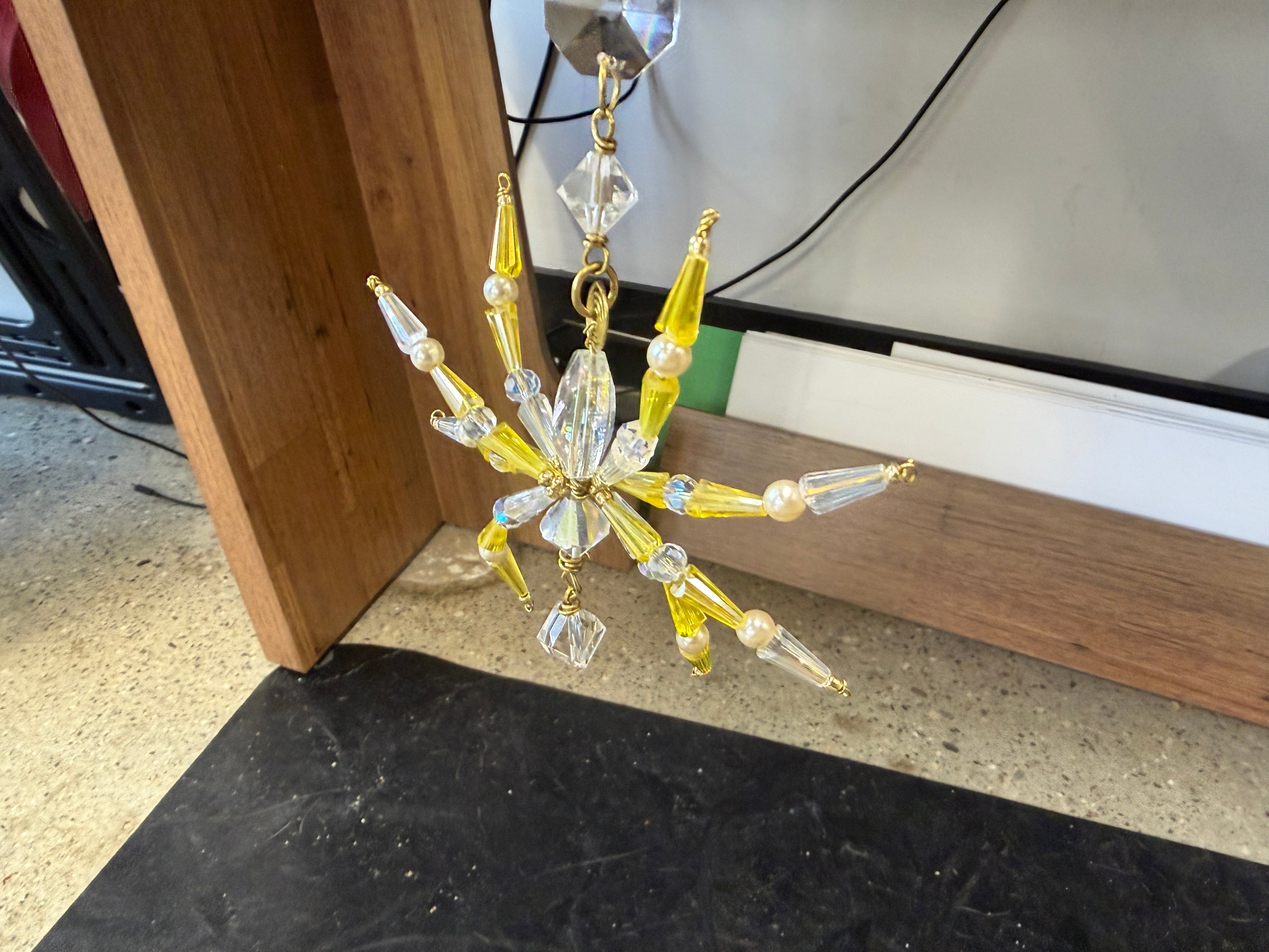 Handcrafted yellow and pearl crystal beaded starburst ornament hanging, made by Sheri Fuceneri