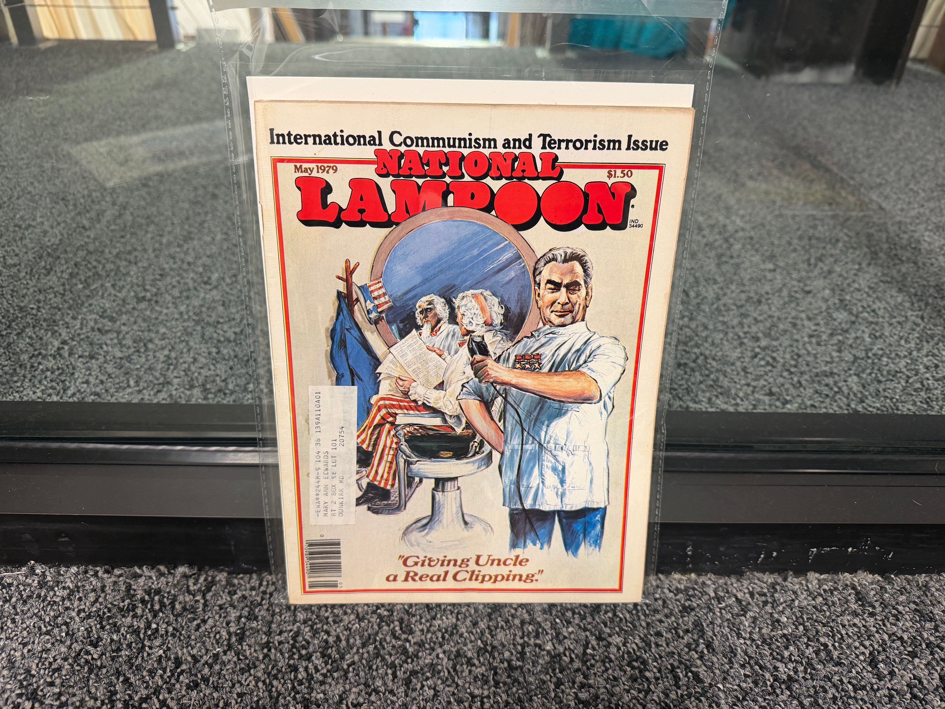 National Lampoon May 1979 International Communism and Terrorism issue cover with barber and Uncle Sam