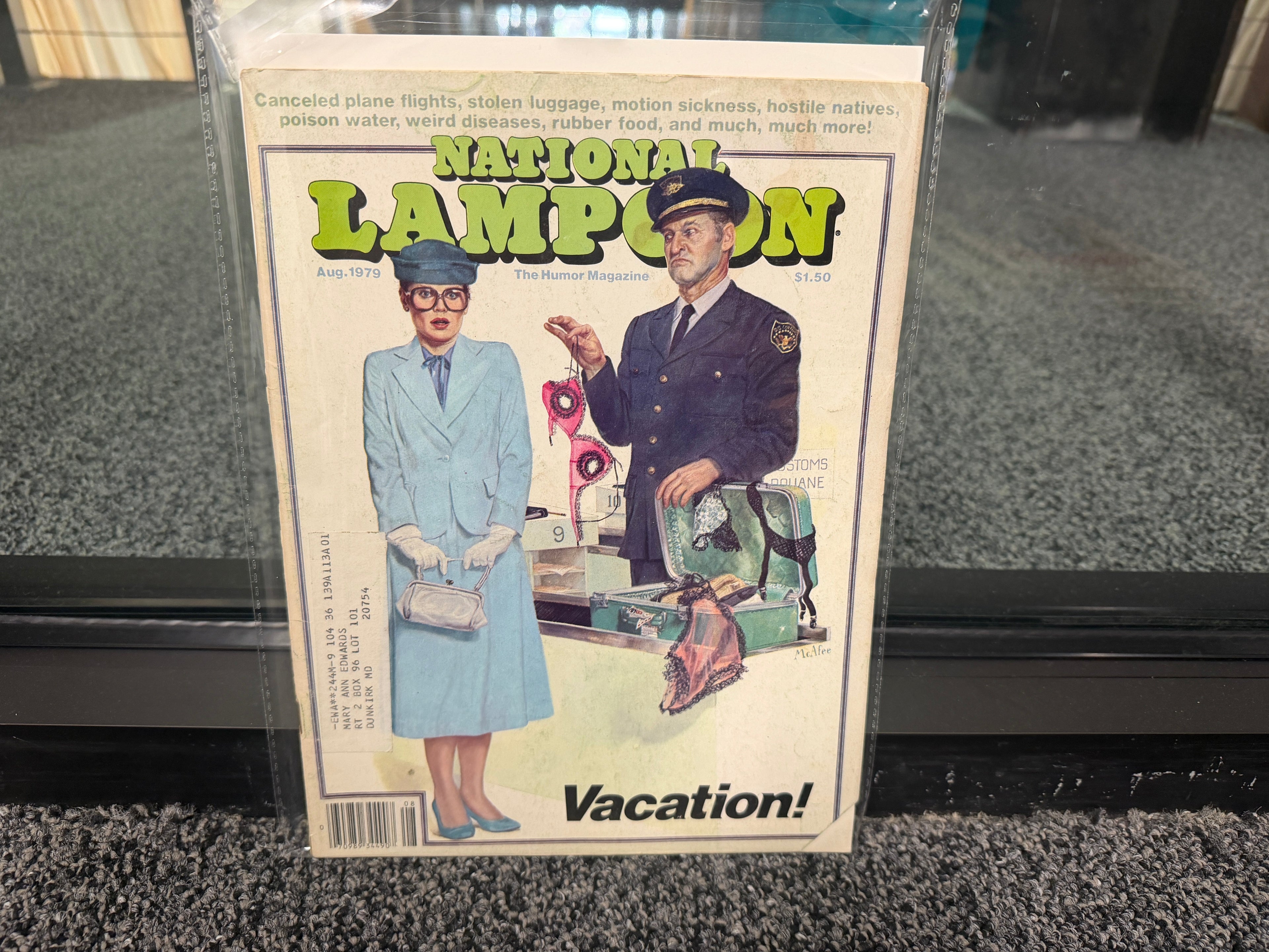 National Lampoon August 1979 Vacation issue cover with customs officer and woman