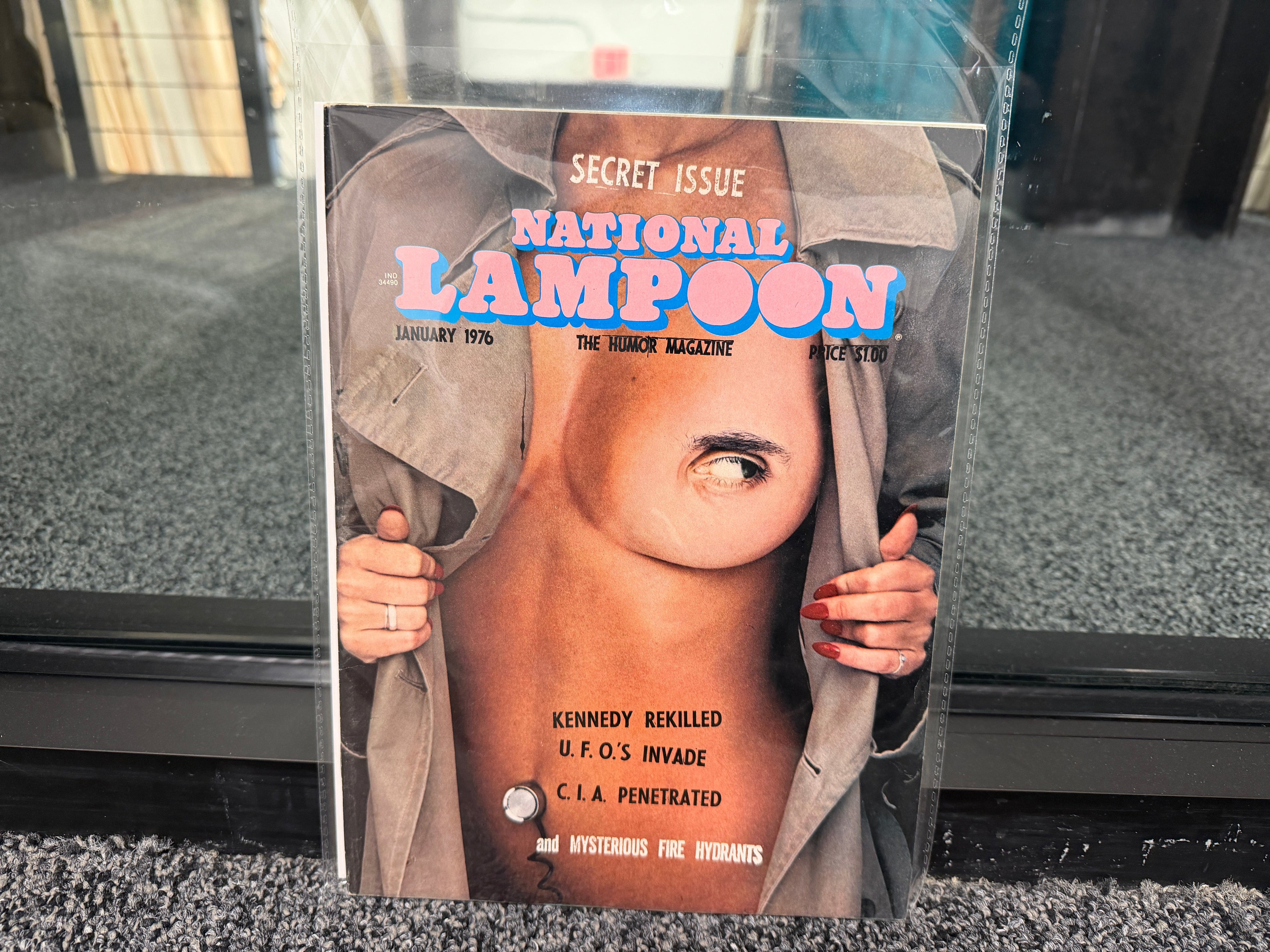 National Lampoon January 1976 Secret Issue cover with trench coat and eyeball