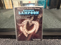 National Lampoon June 1976 Diamond Jubilee Issue cover with rhinestone heart brooch