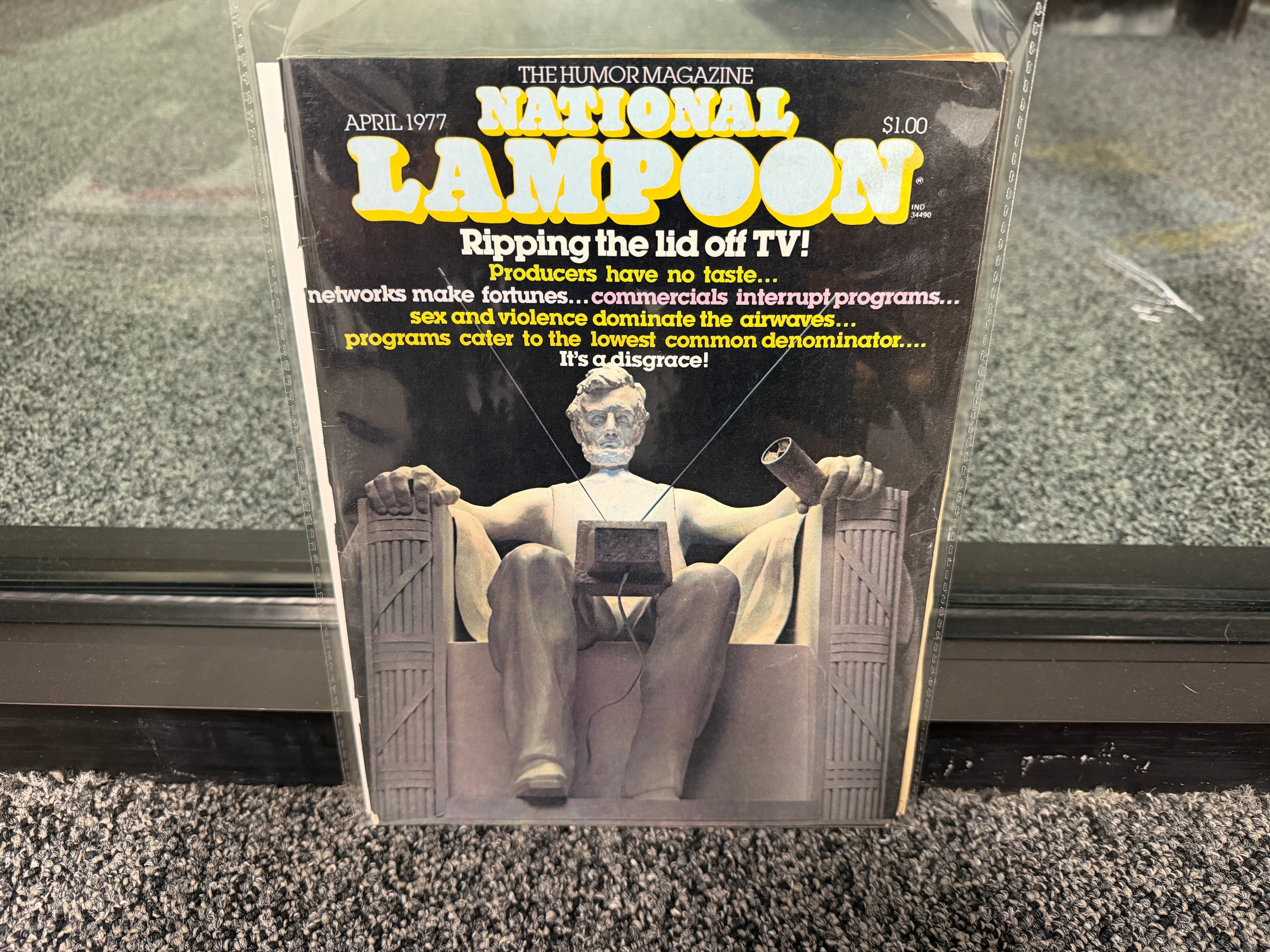 National Lampoon April 1977 Ripping the Lid Off TV issue cover with Lincoln Memorial watching television