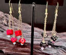 Handmade dice earrings by Sweet Sinister — red and black colorways with silver hooks