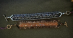 Handmade crystal beaded bracelets by Sweet Sinister — silver/blue macramé style and brown/copper beaded, both with toggle clasps