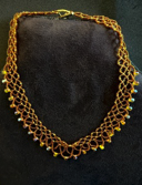 Handmade amber loop fringe collar necklace by Sweet Sinister — gold chain with cascading amber and topaz crystal bead loops